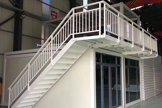 Container house with stairs in two floors