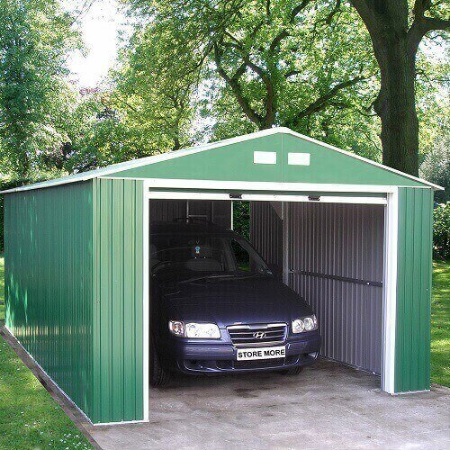 Portable carport in green with a car in it