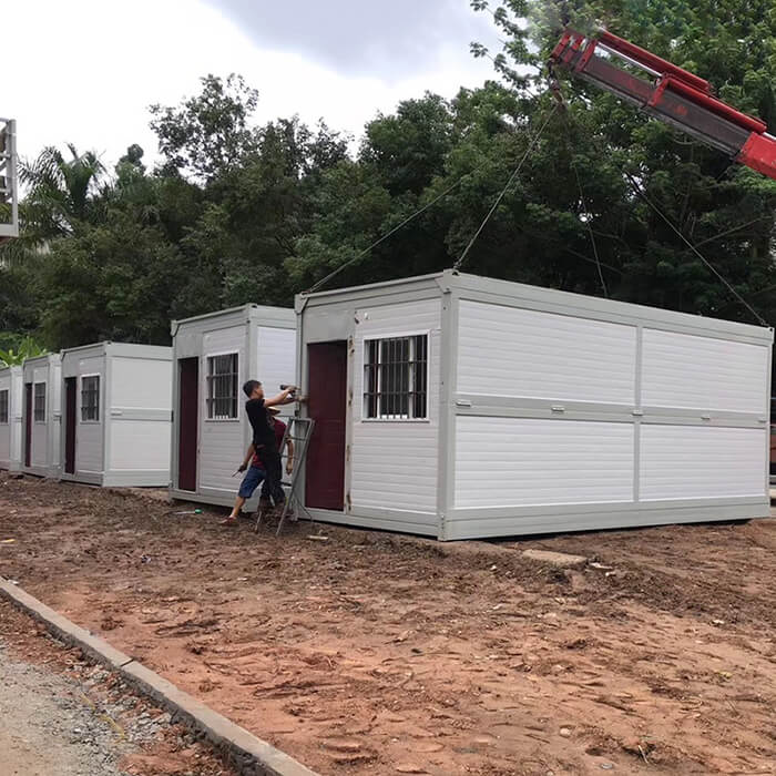 the outside of a 2-storey portable container house with stairs