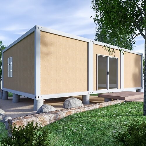 A back view of a Japanese prefab home surrounded by few trees